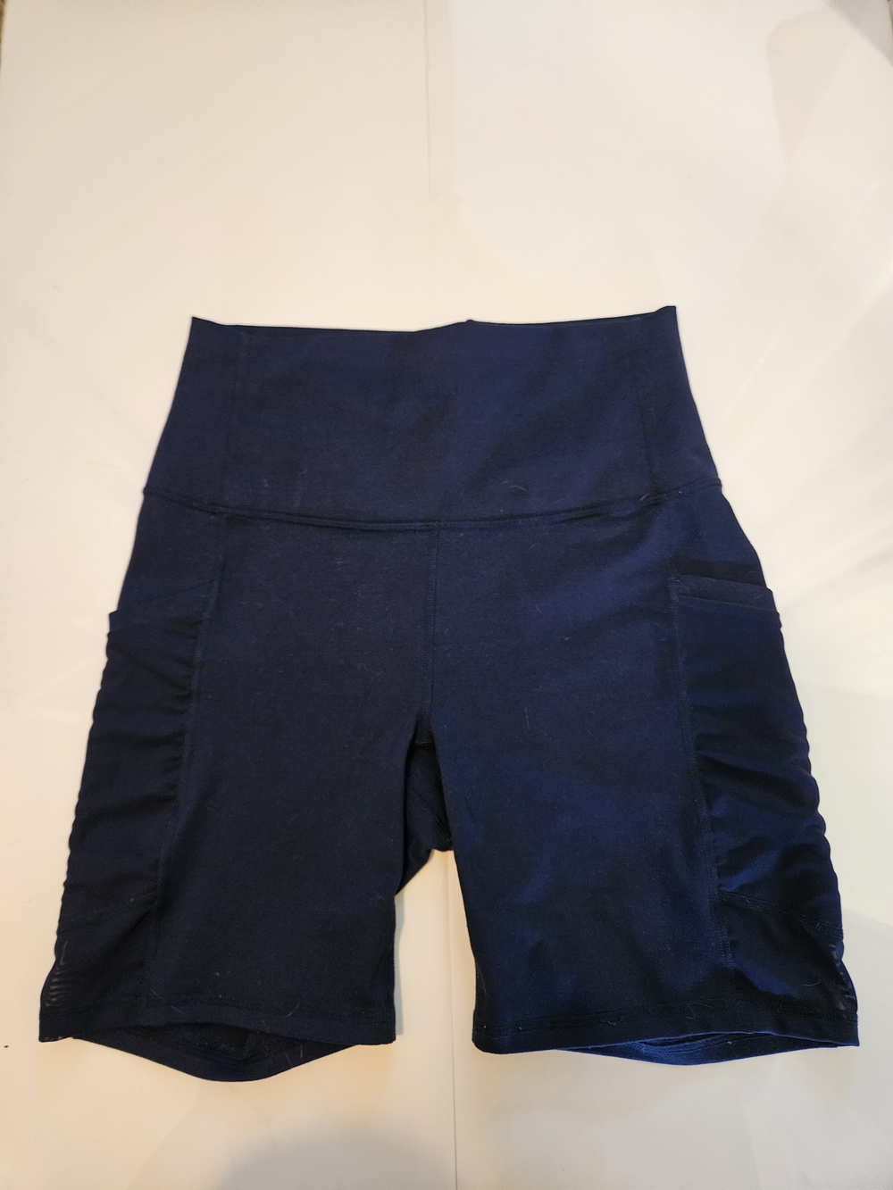Fabletics Navy High-Rise Bike Shorts with Side Pockets